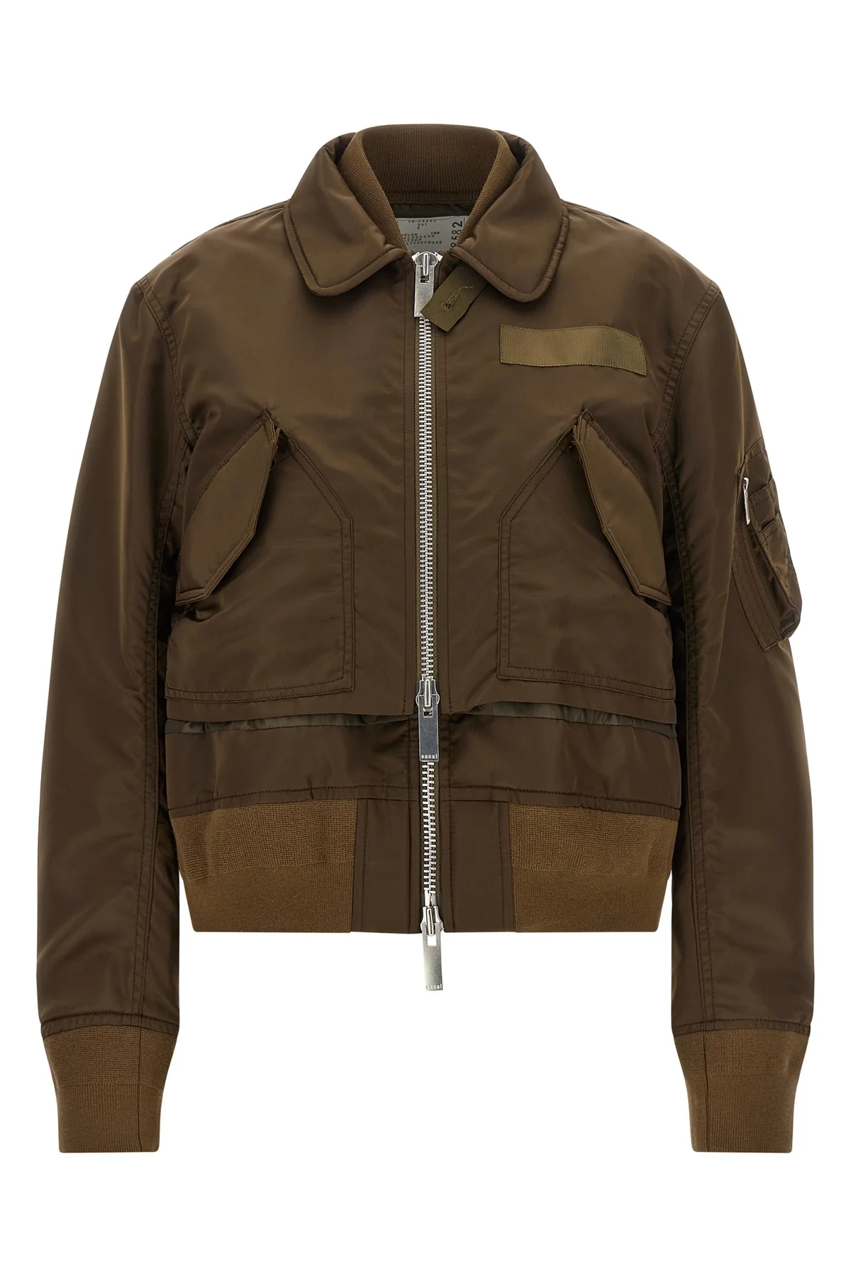 SACAI 1 the sacai double layer blouson redefines the codes of outerwear through a decons