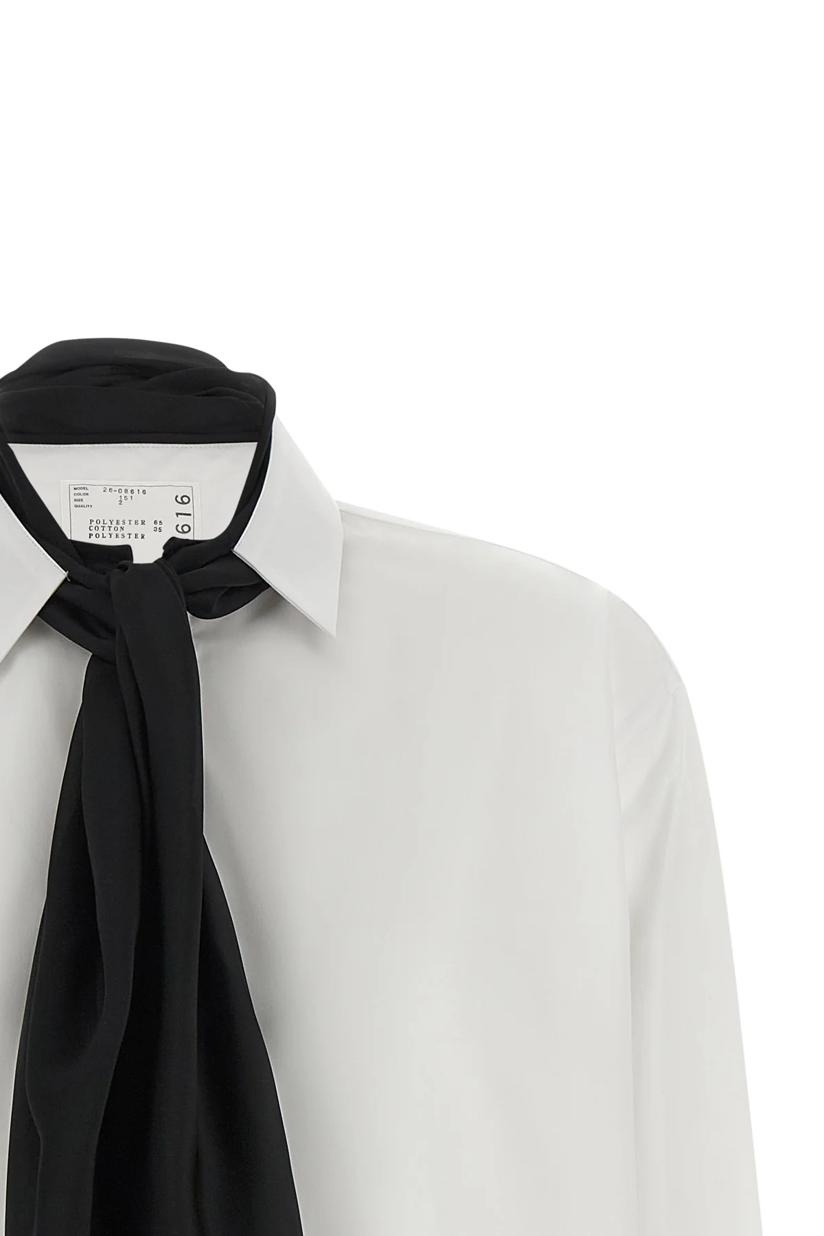 the sacai shirt redefines the codes of classic tailoring through a hybrid and de