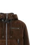 the sacai leather jacket redefines utilitarian outerwear through a masterful con