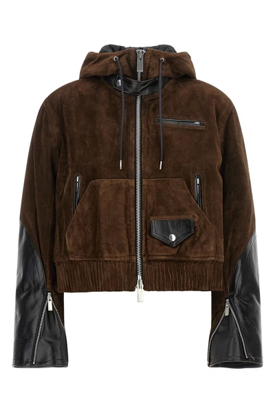the sacai leather jacket redefines utilitarian outerwear through a masterful con