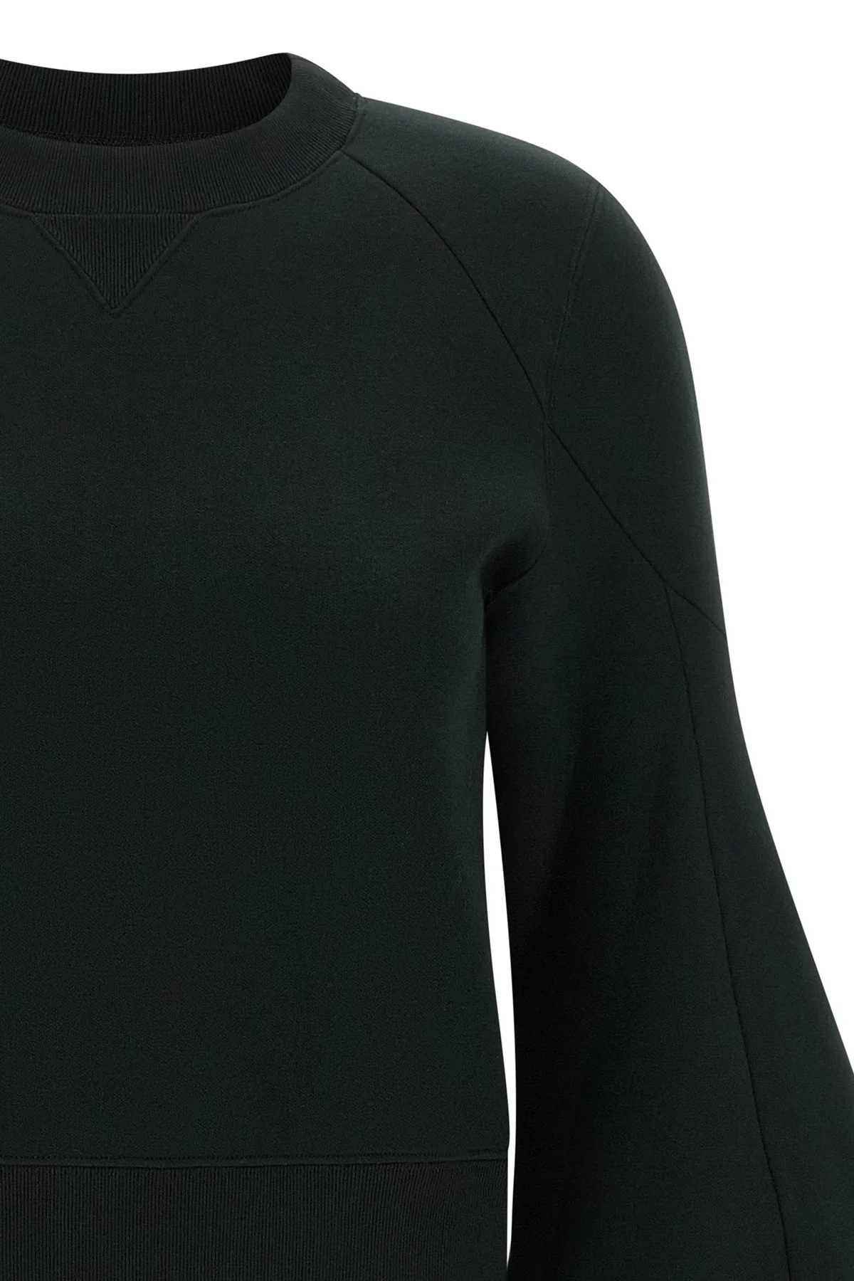 the sacai sweatshirt redefines the volumes of sports knitwear through a sartoria