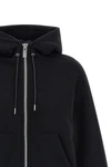 the sacai hoodie redefines the volumes of everyday wardrobe through a relaxed si