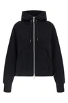the sacai hoodie redefines the volumes of everyday wardrobe through a relaxed si