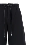 the sacai pants in pure cotton jersey redefine the codes of casual dress through