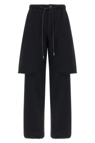 the sacai pants in pure cotton jersey redefine the codes of casual dress through