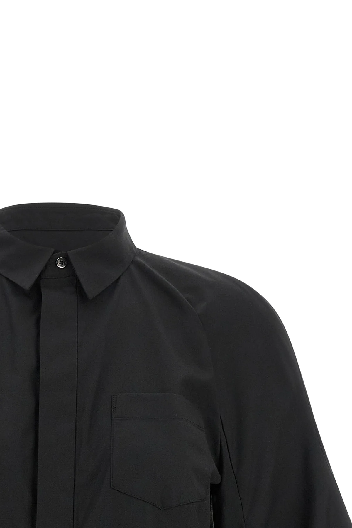 the sacai poplin shirt reinterprets the codes of classic tailoring through unexp