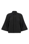 the sacai poplin shirt reinterprets the codes of classic tailoring through unexp