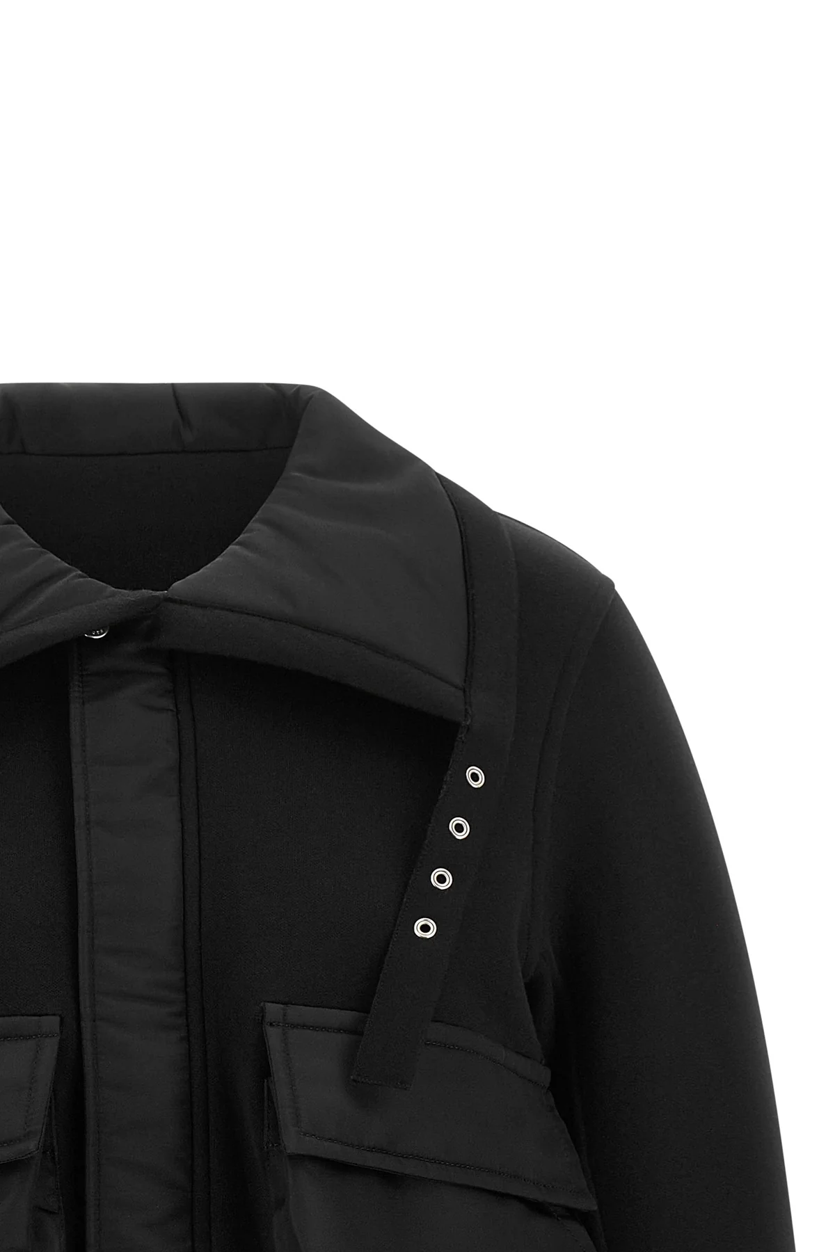the sacai jacket redefines the codes of contemporary outerwear through a masterf