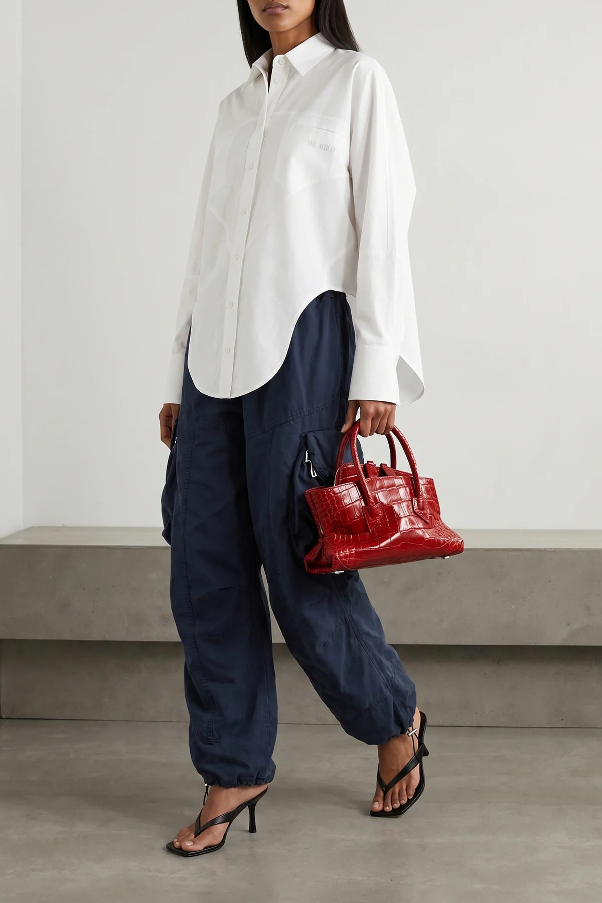 the attico la passeggiata mini handbag redefines classic volumes through a scu