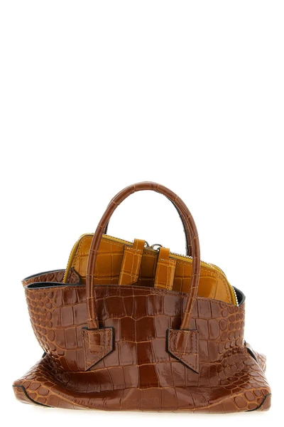 the la passeggiata mini the attico handbag redefines classic volumes through a