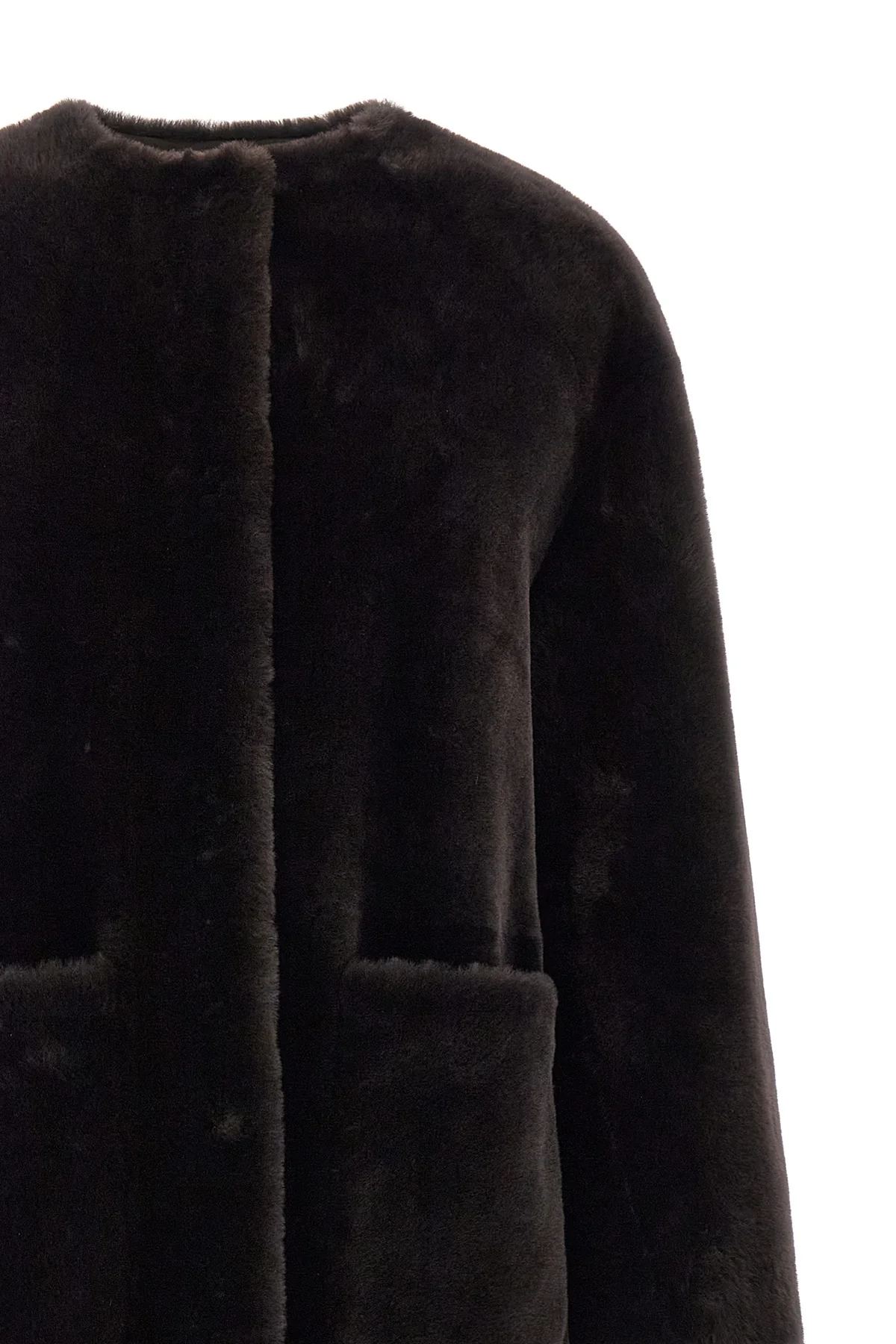 blanchas long fur redefines the codes of outerwear through a linear and rigorou