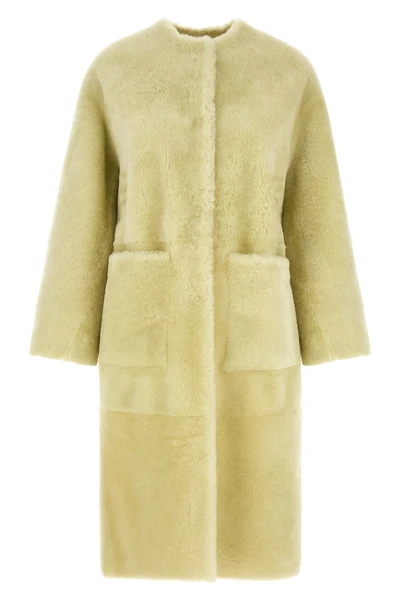 blanchas long fur defines the codes of luxury outerwear through a rigorous stra