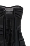 the attico mini dress redefines the evening silhouette through a bold play of tr