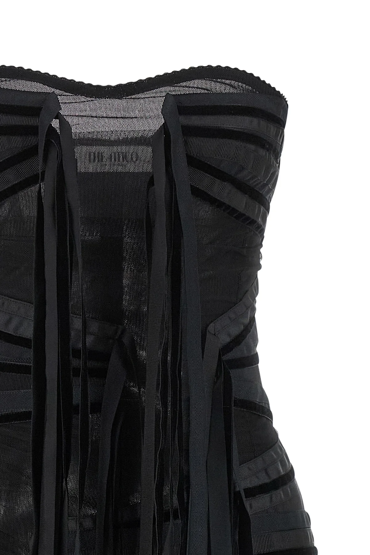 the attico mini dress redefines the evening silhouette through a bold play of tr