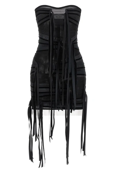 the attico mini dress redefines the evening silhouette through a bold play of tr