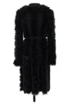 the attico long coat redefines the codes of knitwear through scenographic volume