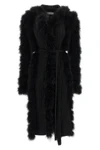 the attico long coat redefines the codes of knitwear through scenographic volume