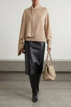 the attico sweater is distinguished by a sculptural construction defined by an a