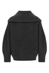 the the attico sweater redefines knitwear codes through a structured silhouette