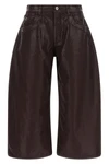 the attico trousers redefine the contemporary wardrobe through a wide and struct