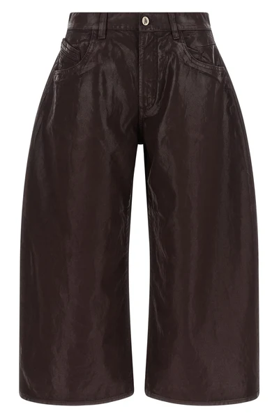 the attico trousers redefine the contemporary wardrobe through a wide and struct