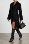 the attico mini skirt defines a sculptural and decisive silhouette through rigor