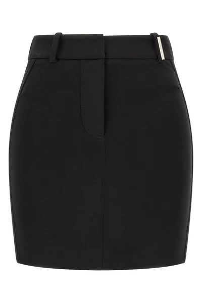 the attico mini skirt defines a sculptural and decisive silhouette through rigor