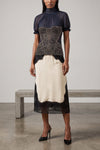 the midi skirt the attico defines a new concept of evening elegance through a pl