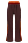 dries van noten huchisa tape trousers redefine sporty aesthetics through a sar