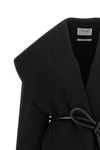 the sportmax spxuguale jacket redefines the volumes of outerwear through a rig