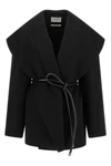 the sportmax spxuguale jacket redefines the volumes of outerwear through a rig