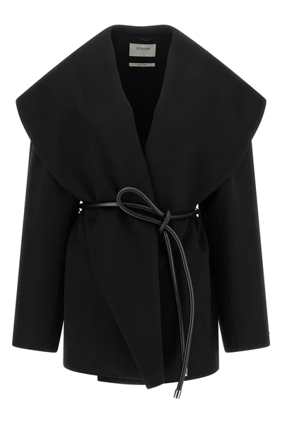 the sportmax spxuguale jacket redefines the volumes of outerwear through a rig