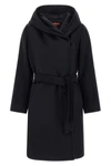 the max mara studio new mang coat sets new standards for outerwear through an
