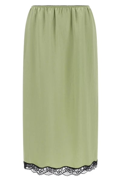 the twinset longuette skirt stands out for a fluid and slippery silhouette