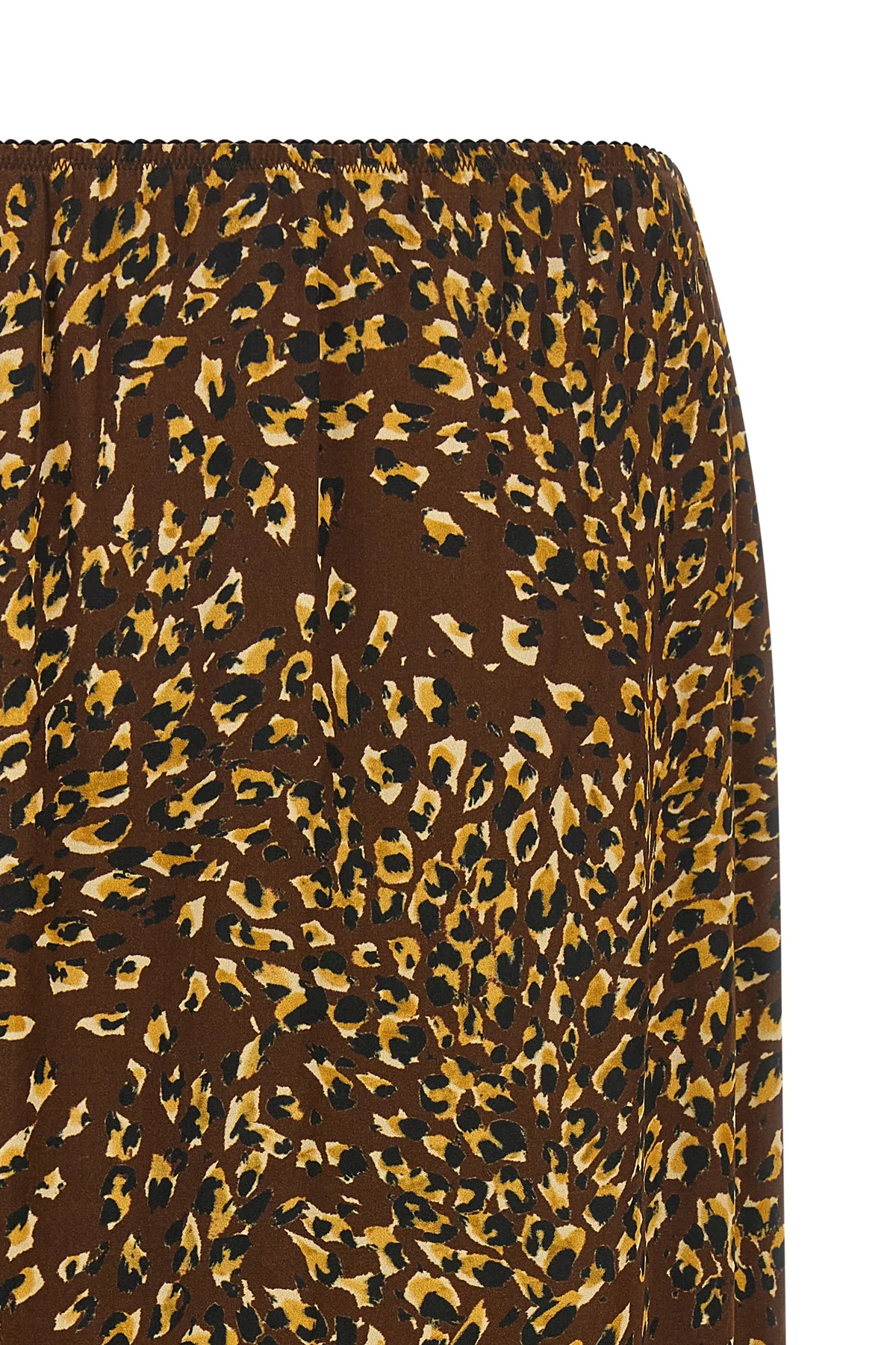 the twinset midi skirt redefines everyday aesthetics through a fluid silhouette