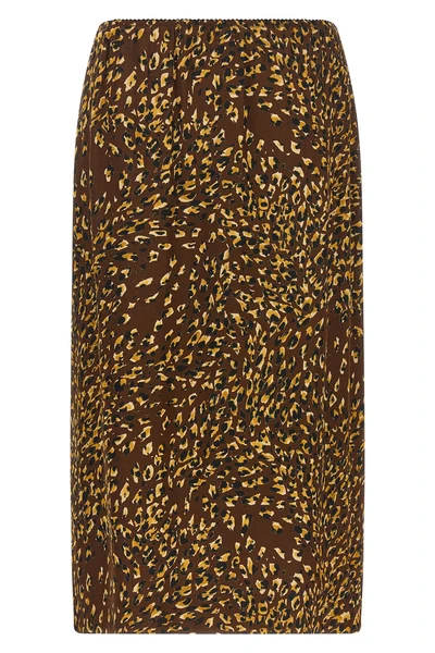 the twinset midi skirt redefines everyday aesthetics through a fluid silhouette