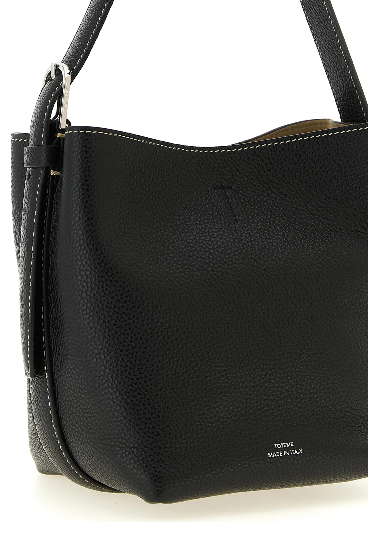the toteme small belted tote handbag in black hammered leather stands out for it