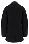the toteme rounded peacoat coat redefines the outerwear through precise architec