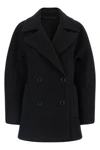 the toteme rounded peacoat coat redefines the outerwear through precise architec