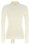 the toteme cardigan redefines the codes of knitwear through an essential and sop