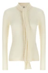 the toteme cardigan redefines the codes of knitwear through an essential and sop