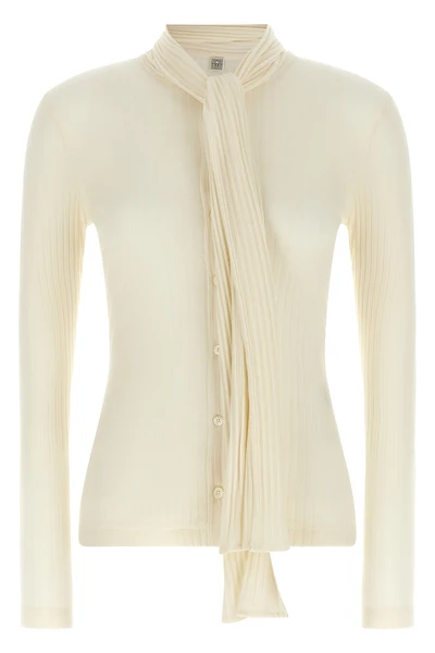 the toteme cardigan redefines the codes of knitwear through an essential and sop