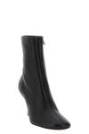 the jacquemus le bottines ankle boots redefines the silhouette of the ankle bo