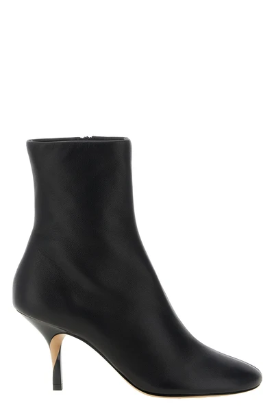 the jacquemus le bottines ankle boots redefines the silhouette of the ankle bo