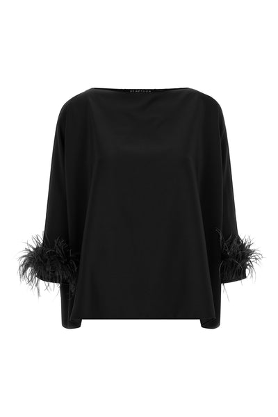 the gianluca capannolo laura blouse redefines the volumes of the contemporary