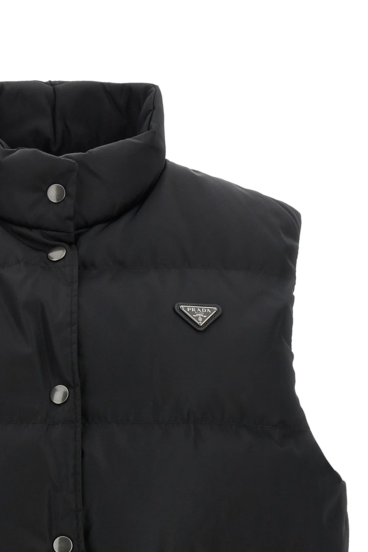 the prada black re-nylon vest redefines the codes of outerwear through a technic