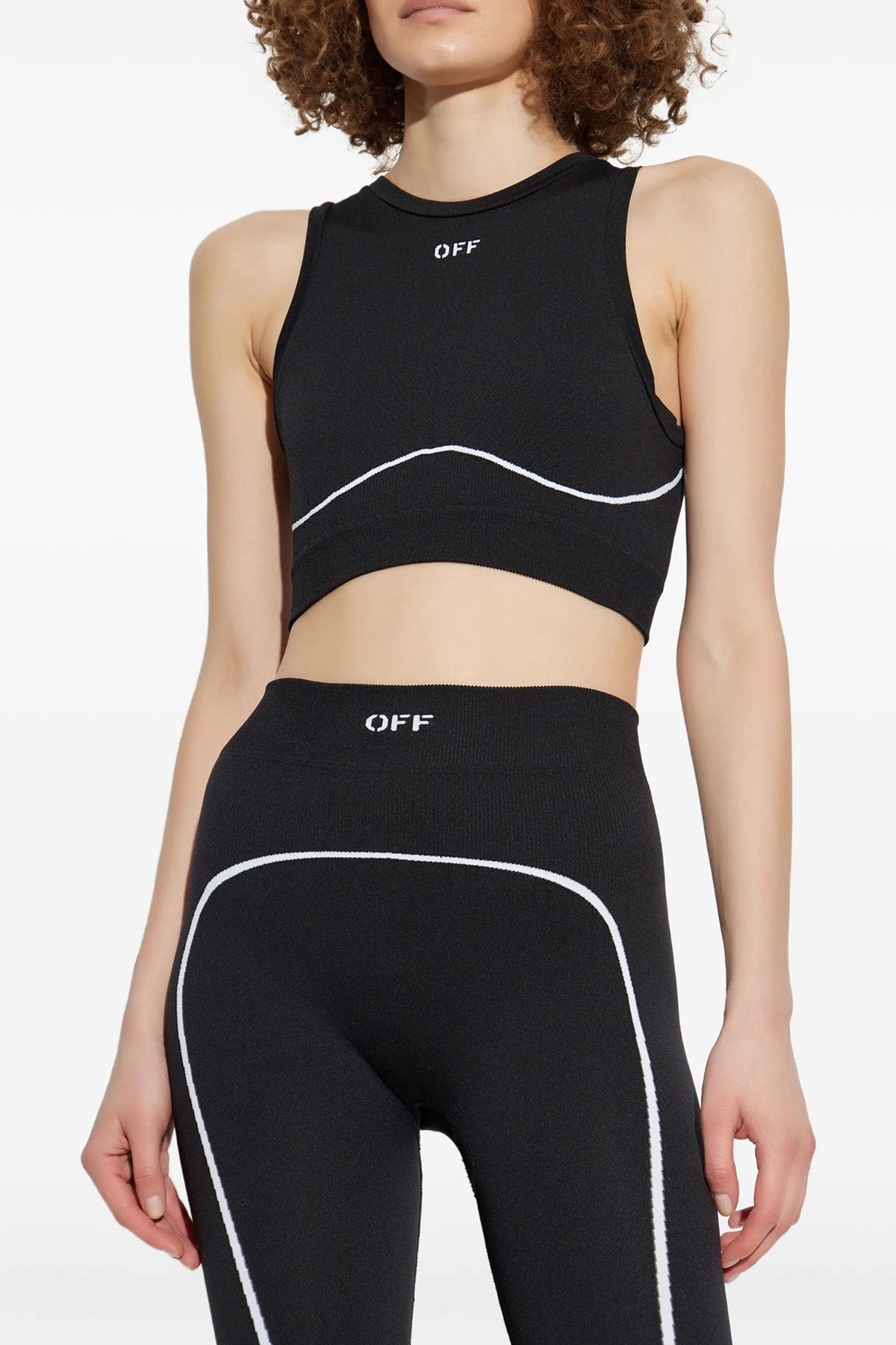 OFF-WHITE M-L off-whites sporty top redefines athletic silhouettes through precise seamless t