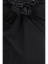 sleeveless dress with a draped neckline