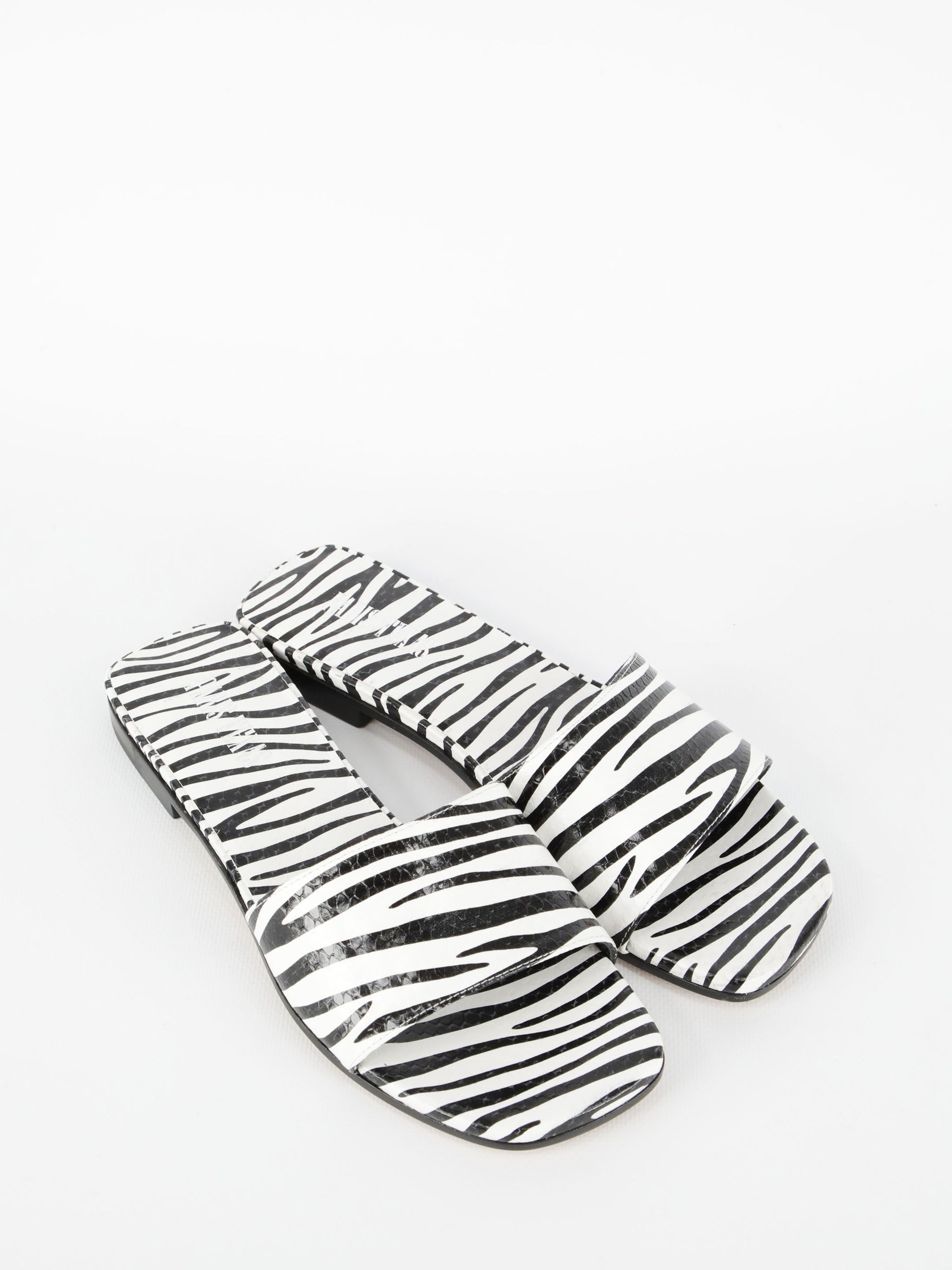 zebra-print flat sandals