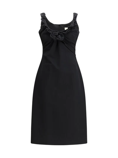 sleeveless dress with a draped neckline